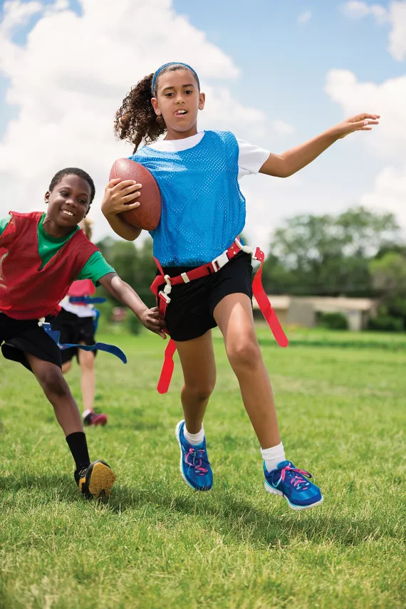 Youth Playing Flag Football